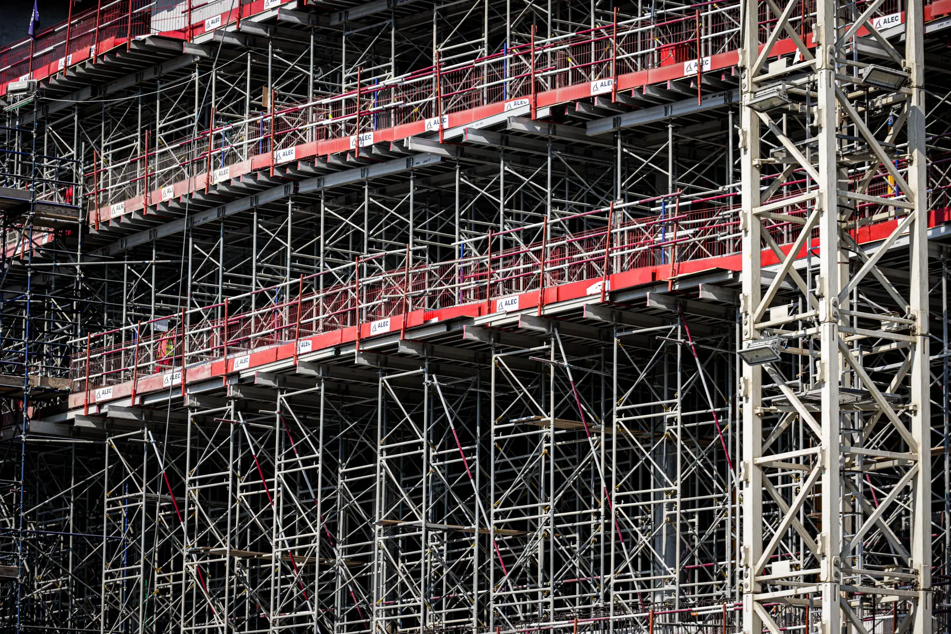 Framed and hoarded commercial fit-out site part-way through construction